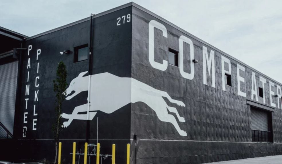 Painted Pickle building exterior with Compeatery mural at Armour Yards in Atlanta