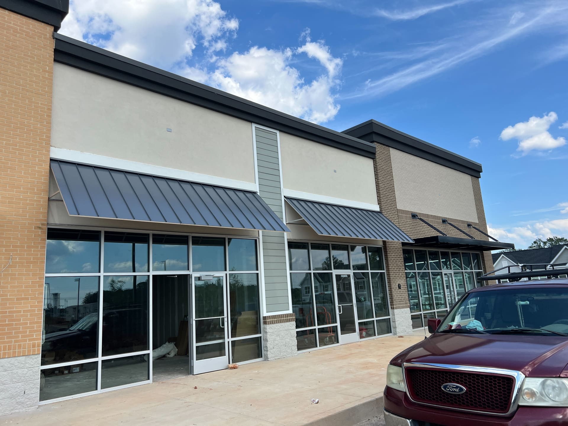 Completed storefront exterior at the Publix-anchored retail center in Greenville, South Carolina