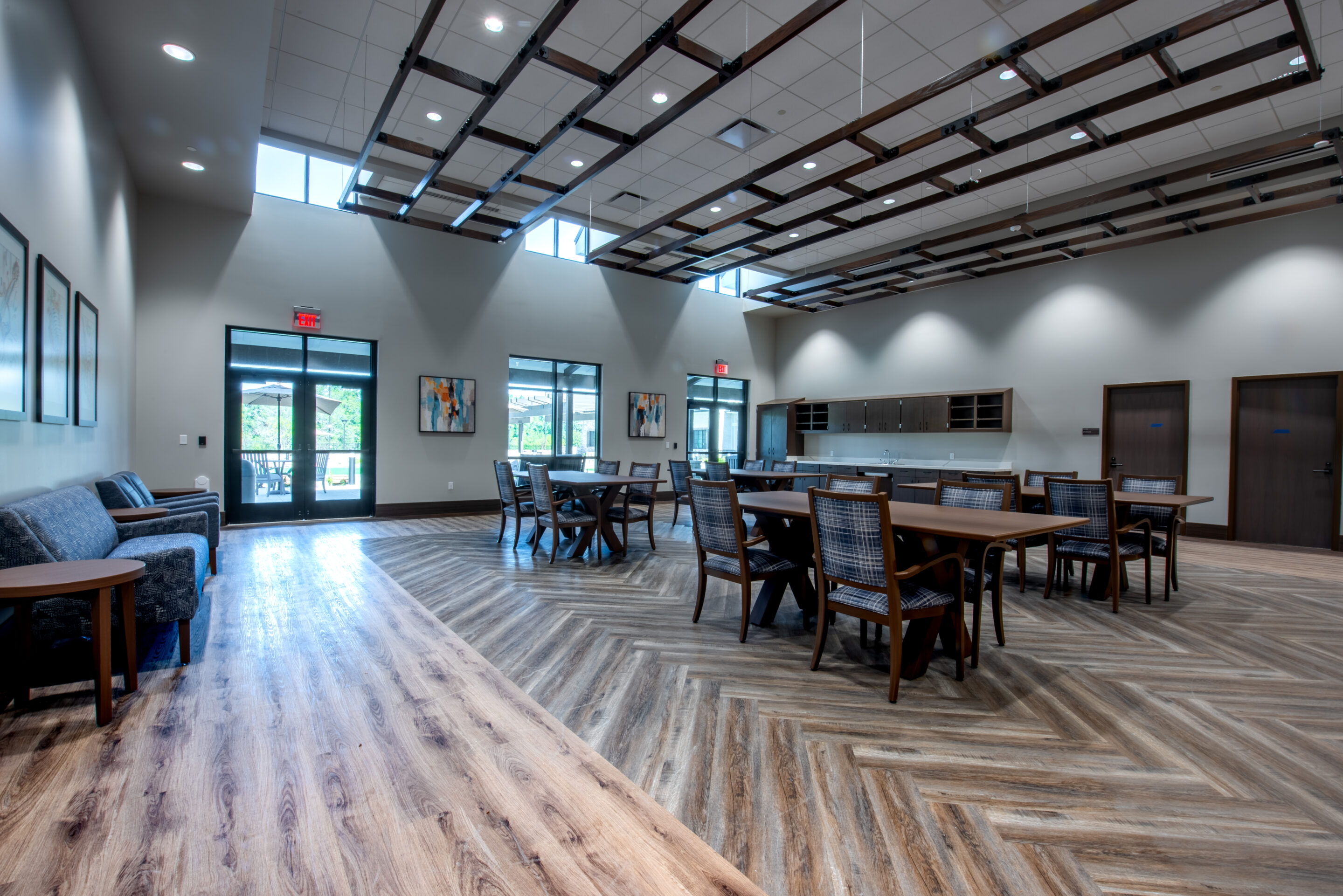 Commercial acoustical ceiling grid and ceiling panels in a dining space